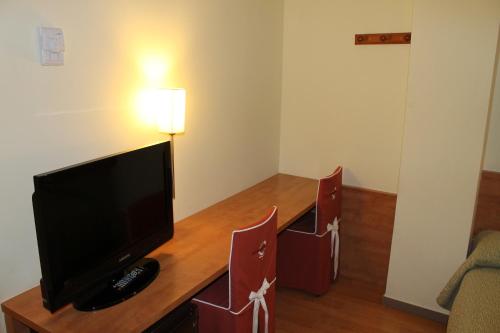 Habitación Triple del hotel Flora Parc. Foto 3