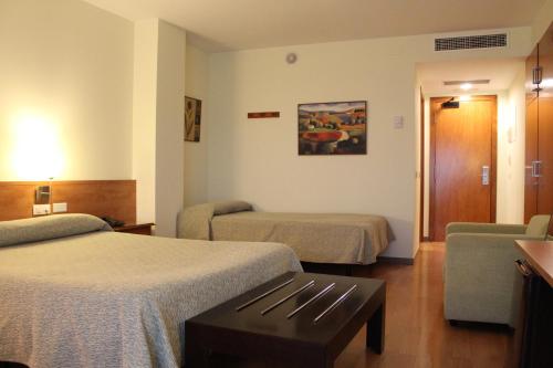 Habitación Familiar del hotel Flora Parc. Foto 3