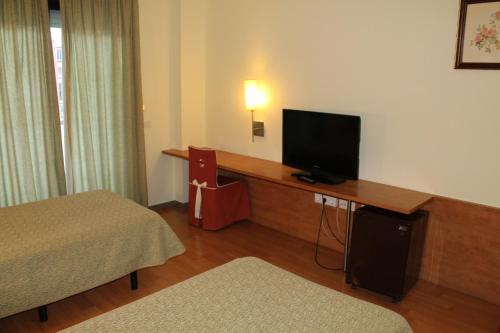 Habitación Doble - 2 camas del hotel Flora Parc. Foto 2
