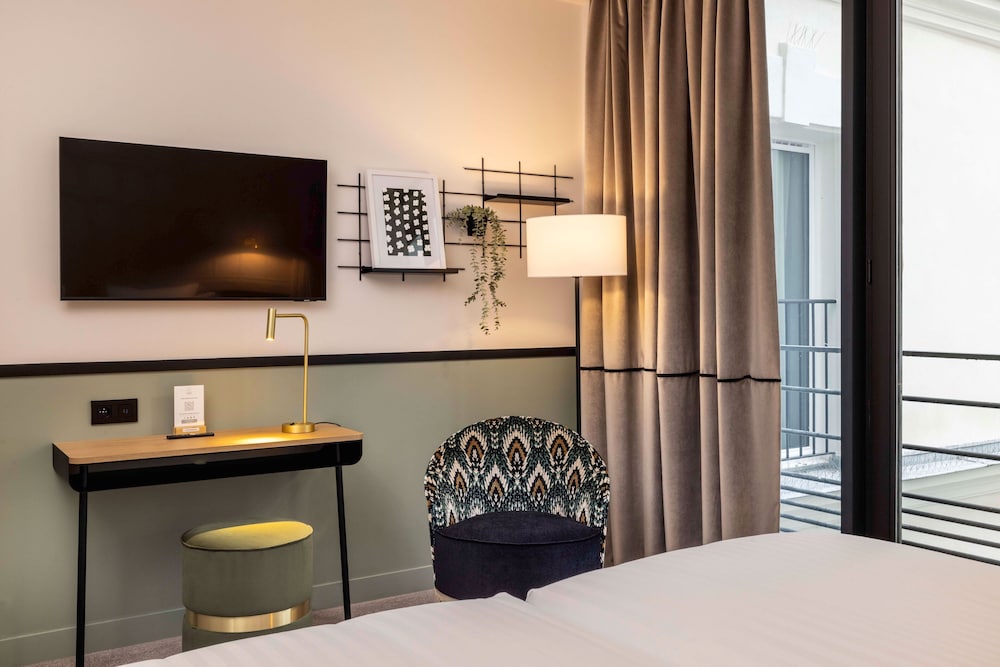 Habitación superior con 2 camas individuales del hotel Grand Cœur Latin. Foto 3