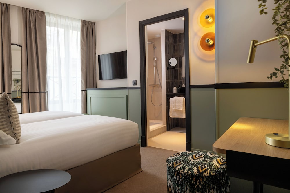 Habitación con 2 camas individuales del hotel Grand Cœur Latin