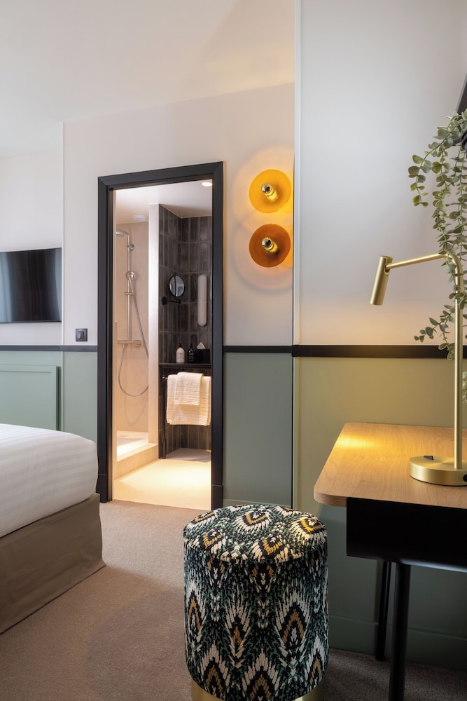 Habitación con 2 camas individuales del hotel Grand Cœur Latin. Foto 1
