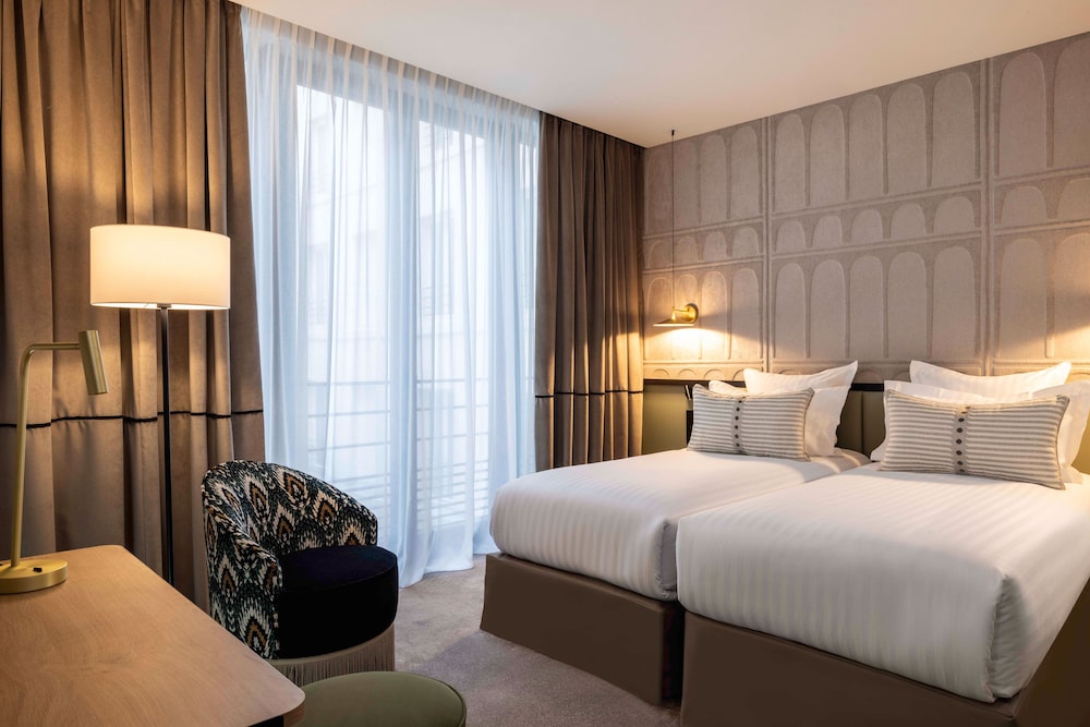Habitación superior con 2 camas individuales del hotel Grand Cœur Latin. Foto 8