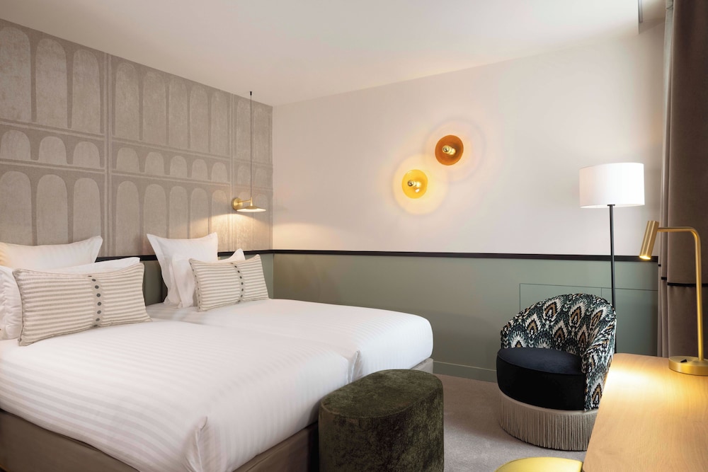 Habitación superior con 2 camas individuales del hotel Grand Cœur Latin. Foto 10