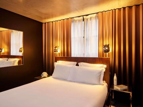Habitación Doble Medium Mama del hotel Mama Shelter Paris East. Foto 1