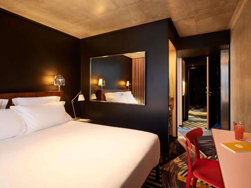 Medium Mama Double Room with Queen Bed del hotel Mama Shelter Paris East. Foto 1