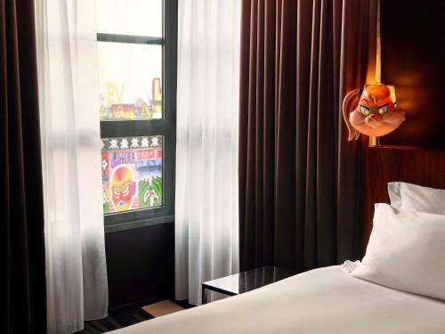 Medium Mama Double Room with Queen Bed del hotel Mama Shelter Paris East. Foto 6
