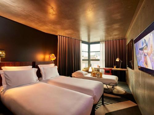 Habitación Triple Mama Grande del hotel Mama Shelter Paris East. Foto 3