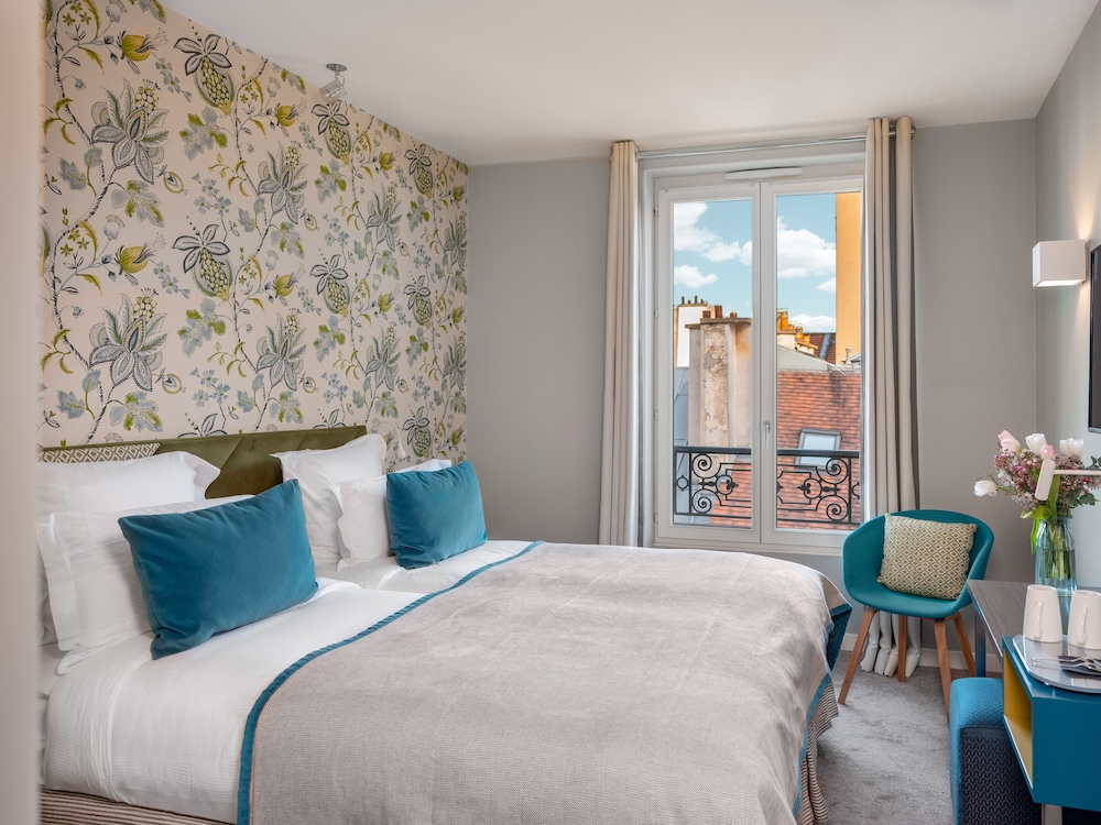 Habitación superior con 2 camas individuales del hotel Le Mareuil