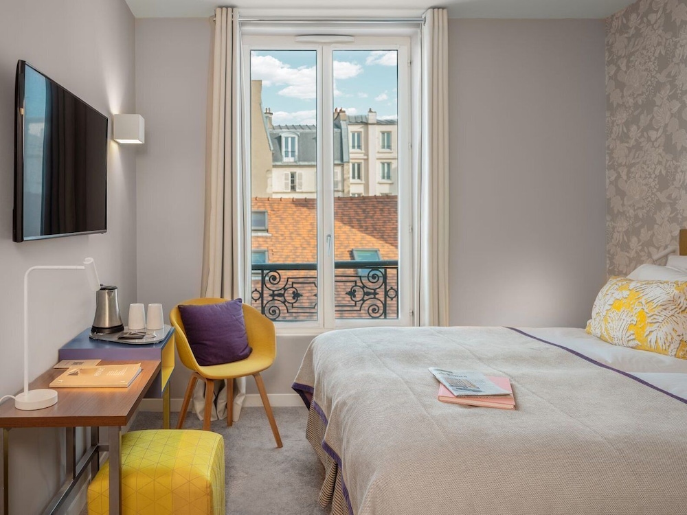 Habitación estándar con 2 camas individuales del hotel Le Mareuil. Foto 4