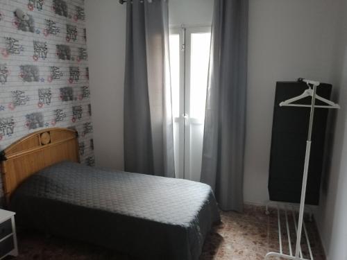 Habitación Doble con balcón - 2 camas del hotel Hostal Alcaravaneras - Adults Only. Foto 10