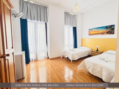 Habitación doble con balcón del hotel Hotel Kasa. Foto 4