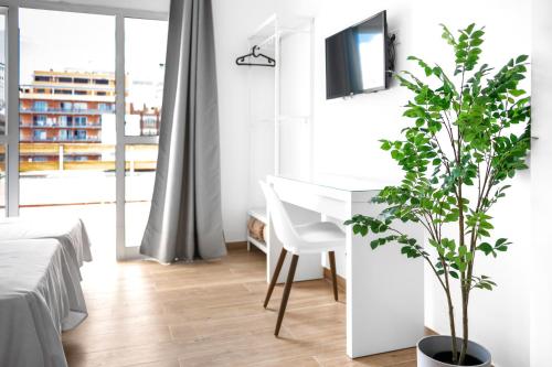 Habitación Triple del hotel Valencia. Foto 1