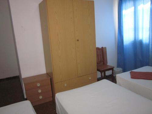 Habitación Triple del hotel Casa De Huespedes San Fernando. Foto 1