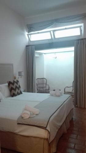 Habitación Doble Económica del hotel Casa Boutique La Pila Del Pato. Foto 1