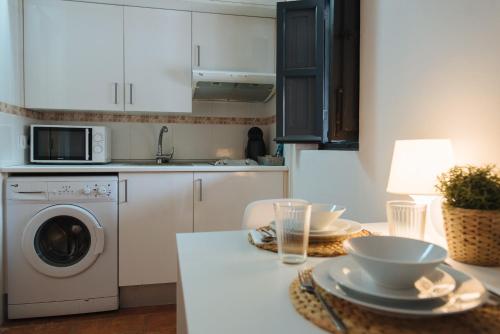 Estudio Deluxe con cama grande del hotel Corral Del Conde. Foto 7