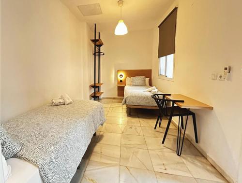 Habitación Doble - 2 camas del hotel La Central Sevilla. Foto 8