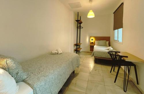 Habitación Doble - 2 camas del hotel La Central Sevilla. Foto 9