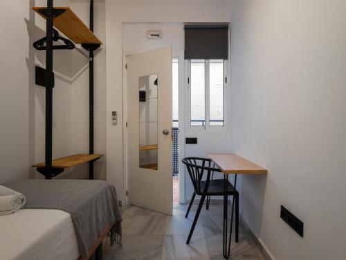 Habitación Individual del hotel La Central Sevilla. Foto 1