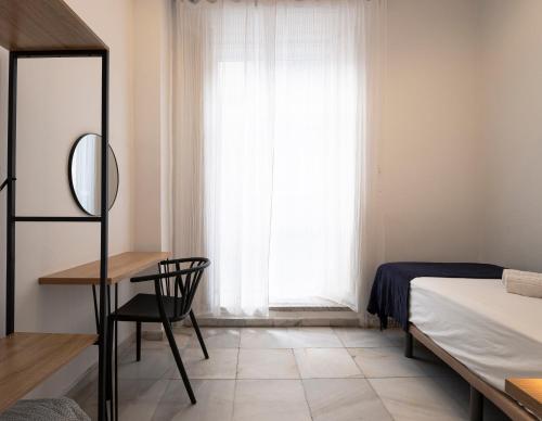 Habitación Individual con baño compartido del hotel La Central Sevilla