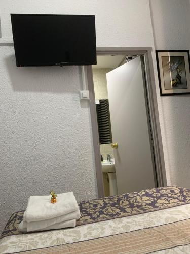 Habitación Doble con baño privado del hotel Alcobia. Foto 1