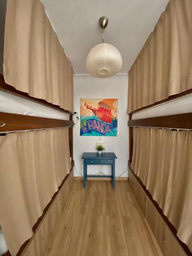 Bed in 4 - Bed Standard Dormitory Room with Bathroom del hotel La Banda Rooftop. Foto 6
