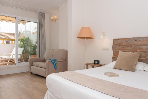 Suite Junior con terraza del hotel Boutique Elvira Plaza. Foto 14