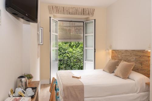 Habitación Doble del hotel Boutique Elvira Plaza. Foto 9