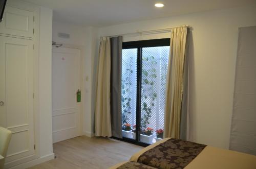 Habitación Doble - 1 o 2 camas del hotel Doña Lina. Foto 5