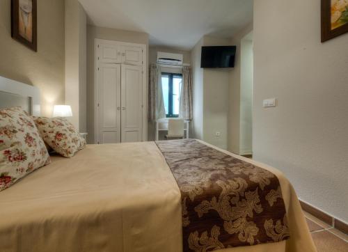 Habitación Triple del hotel Doña Lina. Foto 1