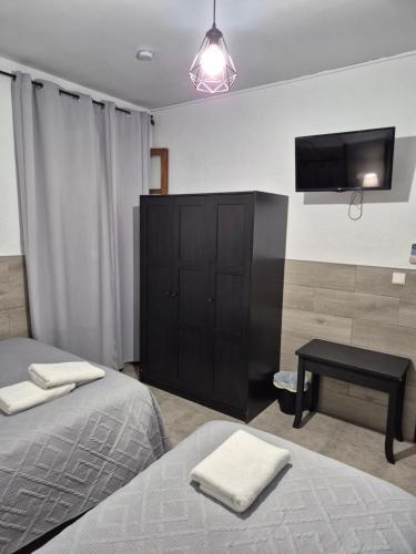 Habitación Cuádruple con baño compartido del hotel Javier. Foto 7