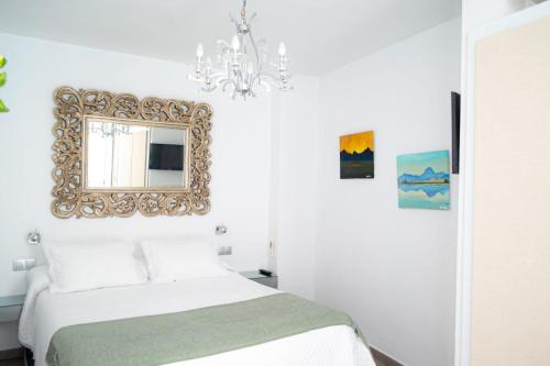 Habitación Doble con cama supletoria del hotel Palacio Alcazar. Foto 3