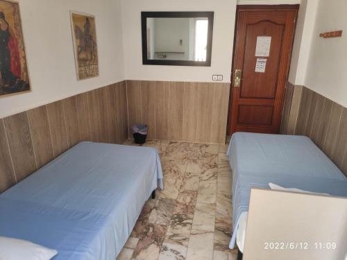 Habitación Doble con baño compartido - 2 camas del hotel Triana Backpackers