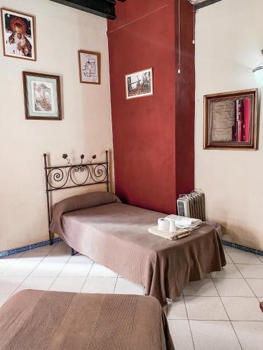 Habitación Cuádruple con baño compartido del hotel Vergara. Foto 1