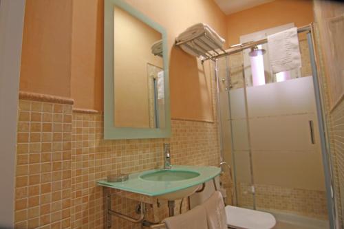 Estudio con balcón del hotel Living Sevilla Apartments Catedral. Foto 8