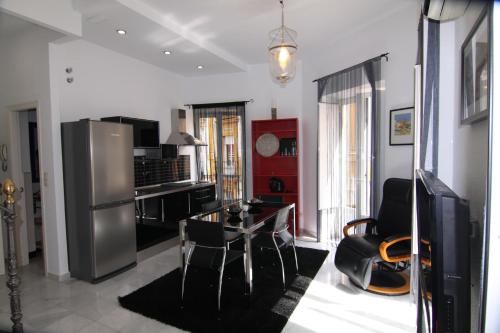 Apartamento de 1 dormitorio con terraza del hotel Living Sevilla Apartments Catedral. Foto 2