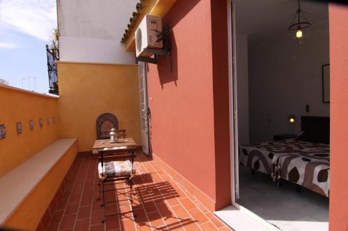 Apartamento de 1 dormitorio con terraza del hotel Living Sevilla Apartments Catedral. Foto 8