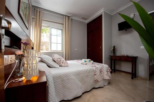 Habitación Doble con baño privado - 1 o 2 camas del hotel La Muralla. Foto 1