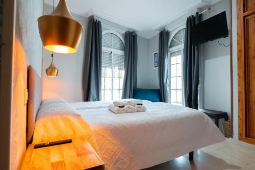 Habitación Doble con cama supletoria y baño privado - 2 camas del hotel La Muralla