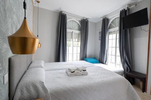 Habitación Doble con cama supletoria y baño privado - 2 camas del hotel La Muralla. Foto 2