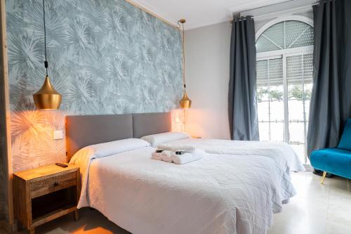 Habitación Doble con cama supletoria y baño privado - 2 camas del hotel La Muralla. Foto 5