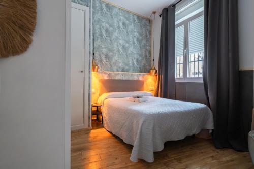 Habitación Doble Económica con baño privado - 1 cama doble del hotel La Muralla. Foto 1