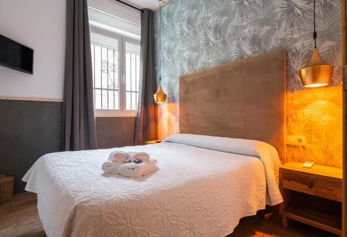 Habitación Doble Económica con baño privado - 1 cama doble del hotel La Muralla. Foto 3