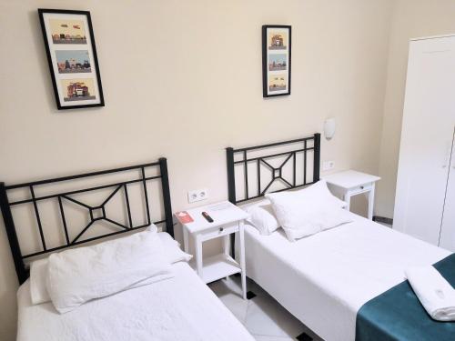 Habitación Doble con baño privado - 2 camas del hotel Pérez Montilla. Foto 3