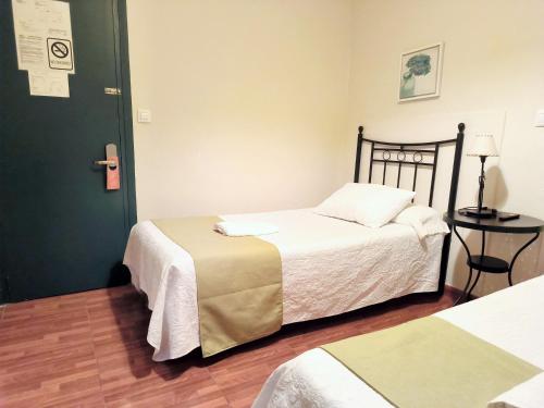 Habitación Doble con baño privado - 2 camas del hotel Pérez Montilla. Foto 7