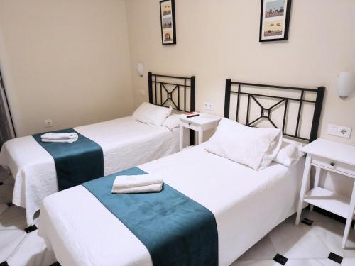 Habitación Doble con baño privado - 2 camas del hotel Pérez Montilla. Foto 5
