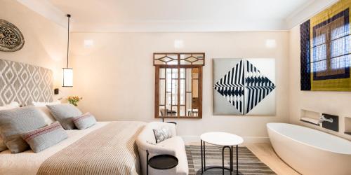 Habitación Doble con terraza del hotel Boutique Corral Del Rey By Aluz Collection. Foto 4