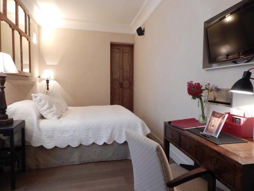 Habitación Deluxe con cama extragrande del hotel Boutique Corral Del Rey By Aluz Collection. Foto 14