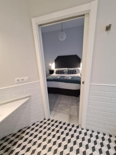 Habitación Doble Económica del hotel Hom Museo. Foto 5