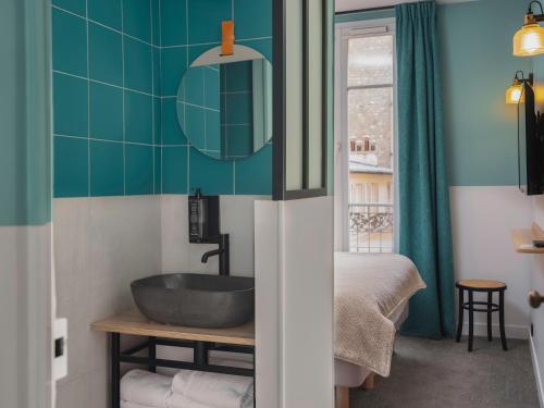 Suite Estándar del hotel Ibis Styles Montmartre Nord. Foto 10